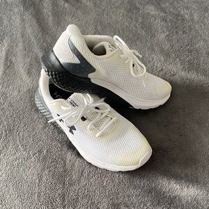 Men’s size 10 Under Armour Black and White Running Shoes